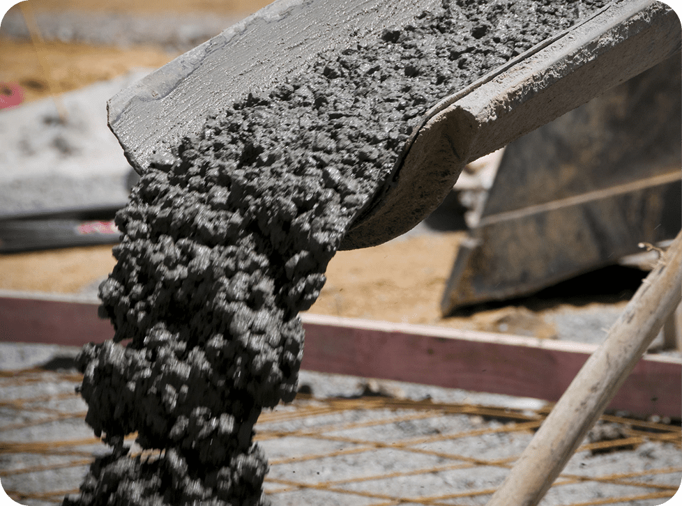Concrete being poured at construction site.